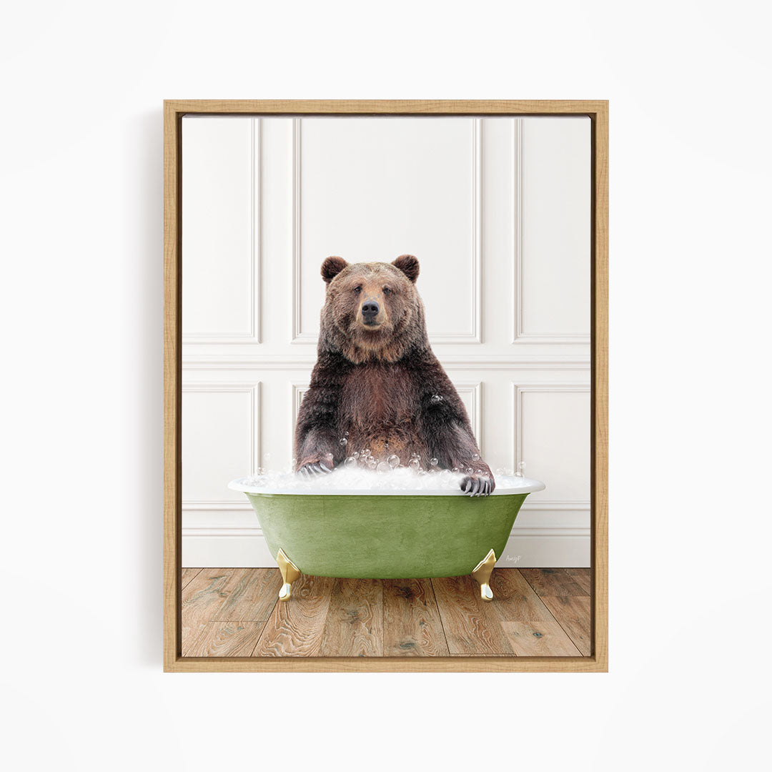 A brown bear sitting in a green bathtub filled with water, appearing to enjoy the bath.