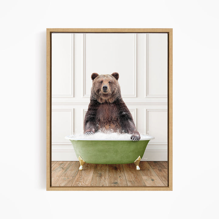 A brown bear sitting in a green bathtub filled with water, appearing to enjoy the bath.