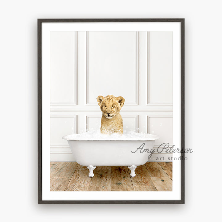 a picture of a baby lion in a bathtub