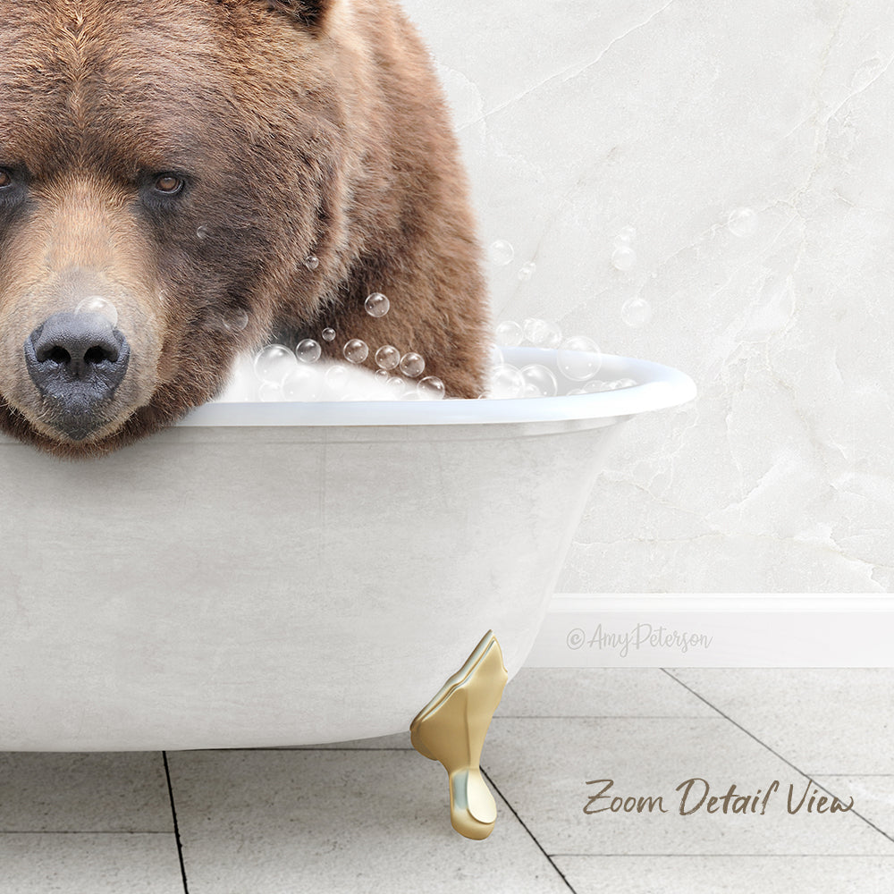 A brown bear is sitting in a white bathtub filled with bubbles, appearing to enjoy a relaxing bath.