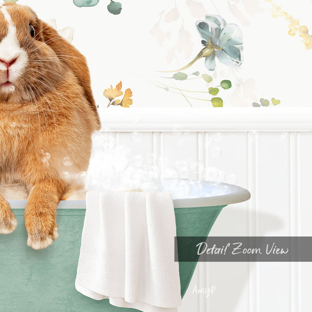 A brown rabbit sitting in a green bathtub filled with bubbles, with a towel and a floral pattern on the wall behind it.