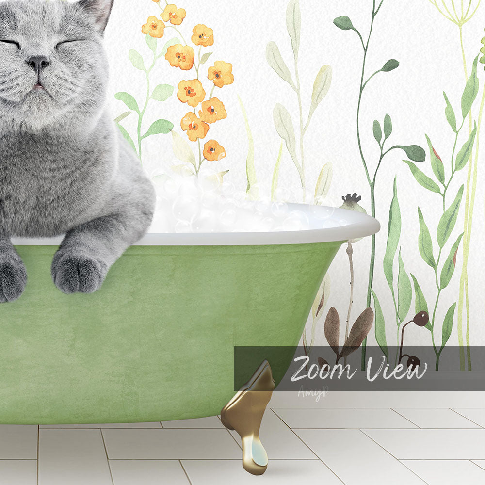 A gray cat sitting in a green bathtub, surrounded by a floral wallpaper.