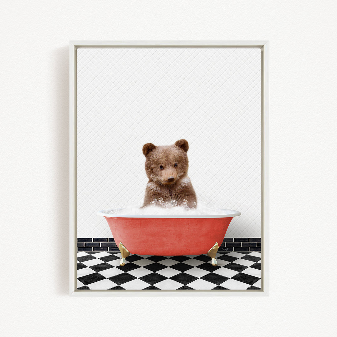 A cute brown bear sitting in a red bathtub filled with bubbles, surrounded by a black and white checkered floor.