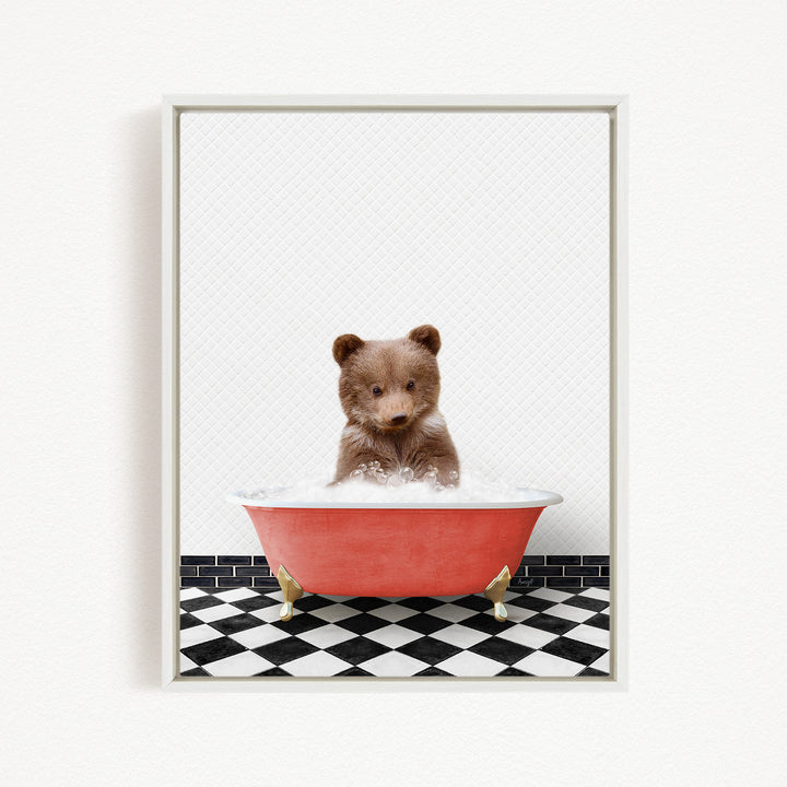 A cute brown bear sitting in a red bathtub filled with bubbles, surrounded by a black and white checkered floor.