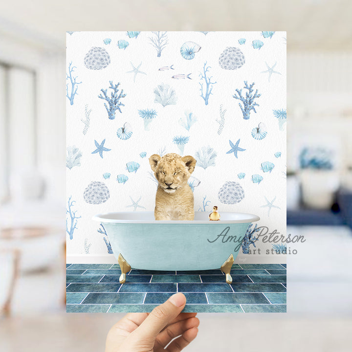 a hand holding up a card with a picture of a lion in a bathtub