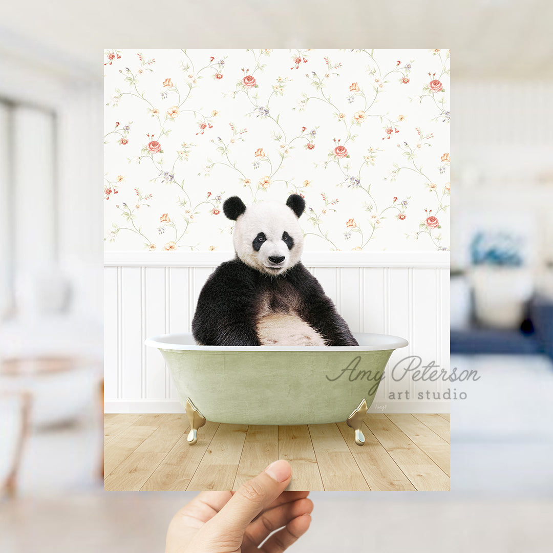 a panda bear sitting in a bath tub