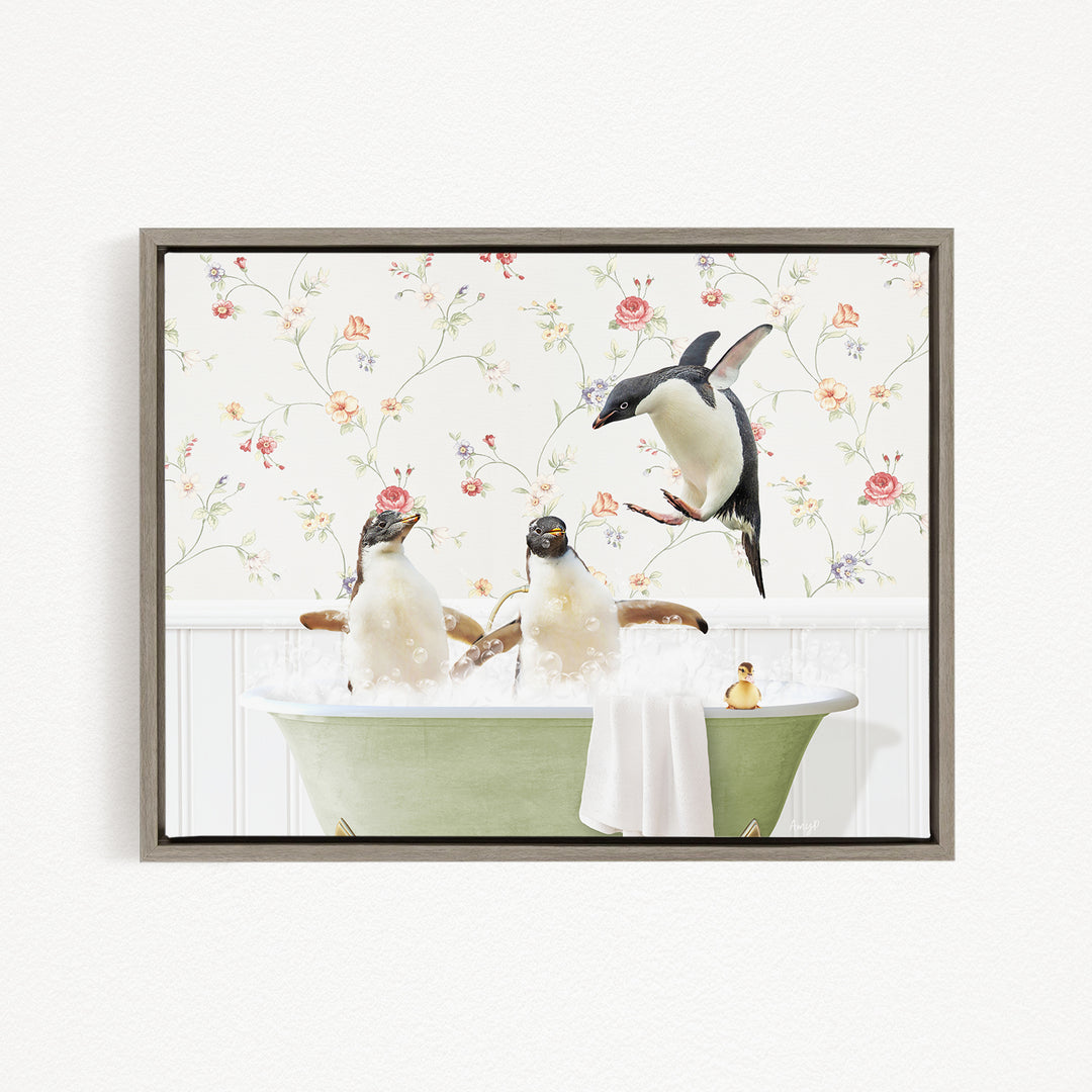 A framed image depicting three penguins sitting in a green bathtub, with one penguin flying towards the others.