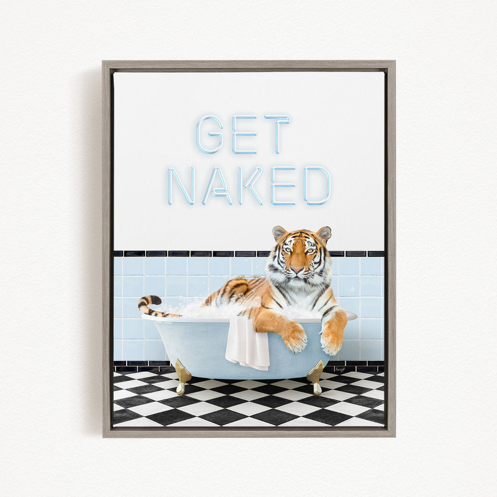 A tiger sitting in a bathtub with the text "GET NAKED" displayed above it.