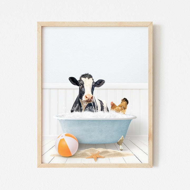 a cow is taking a bath in a blue tub