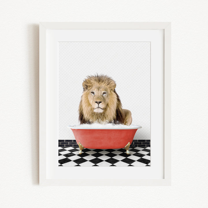 A lion sitting in a red bathtub on a black and white checkered floor.