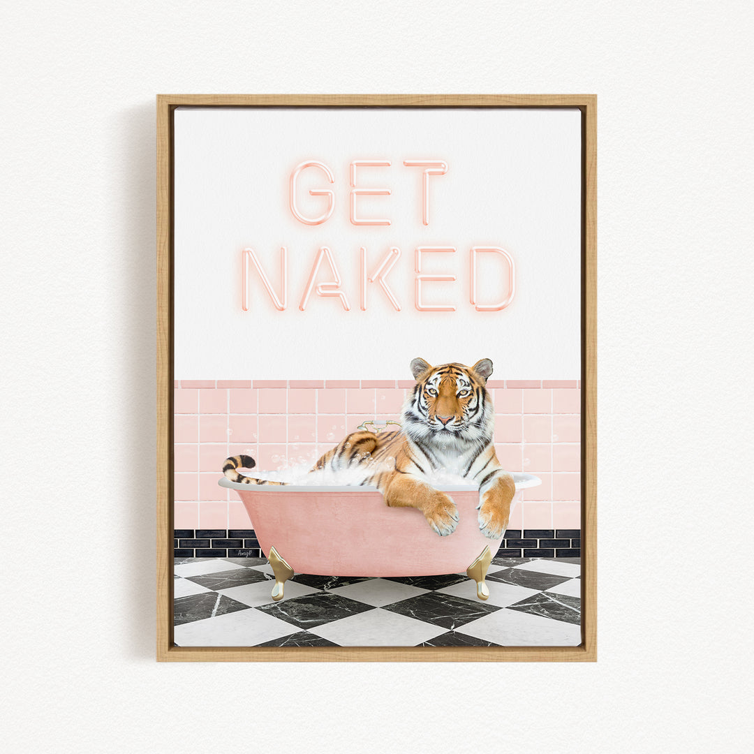 A framed print featuring a tiger sitting in a pink bathtub with the text "GET NAKED" displayed above it.