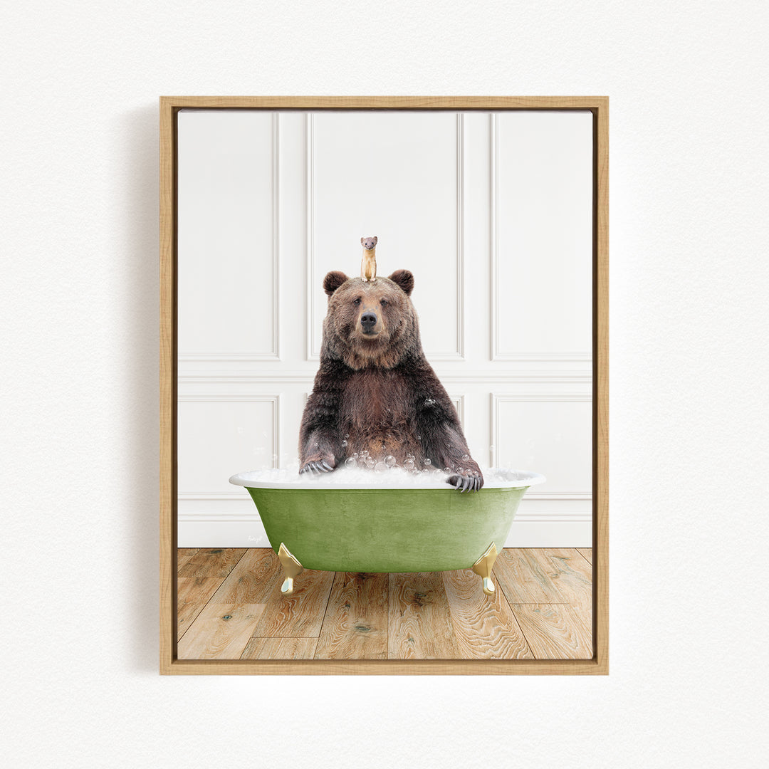 A brown bear sitting in a green bathtub, with a small bird perched on its head.