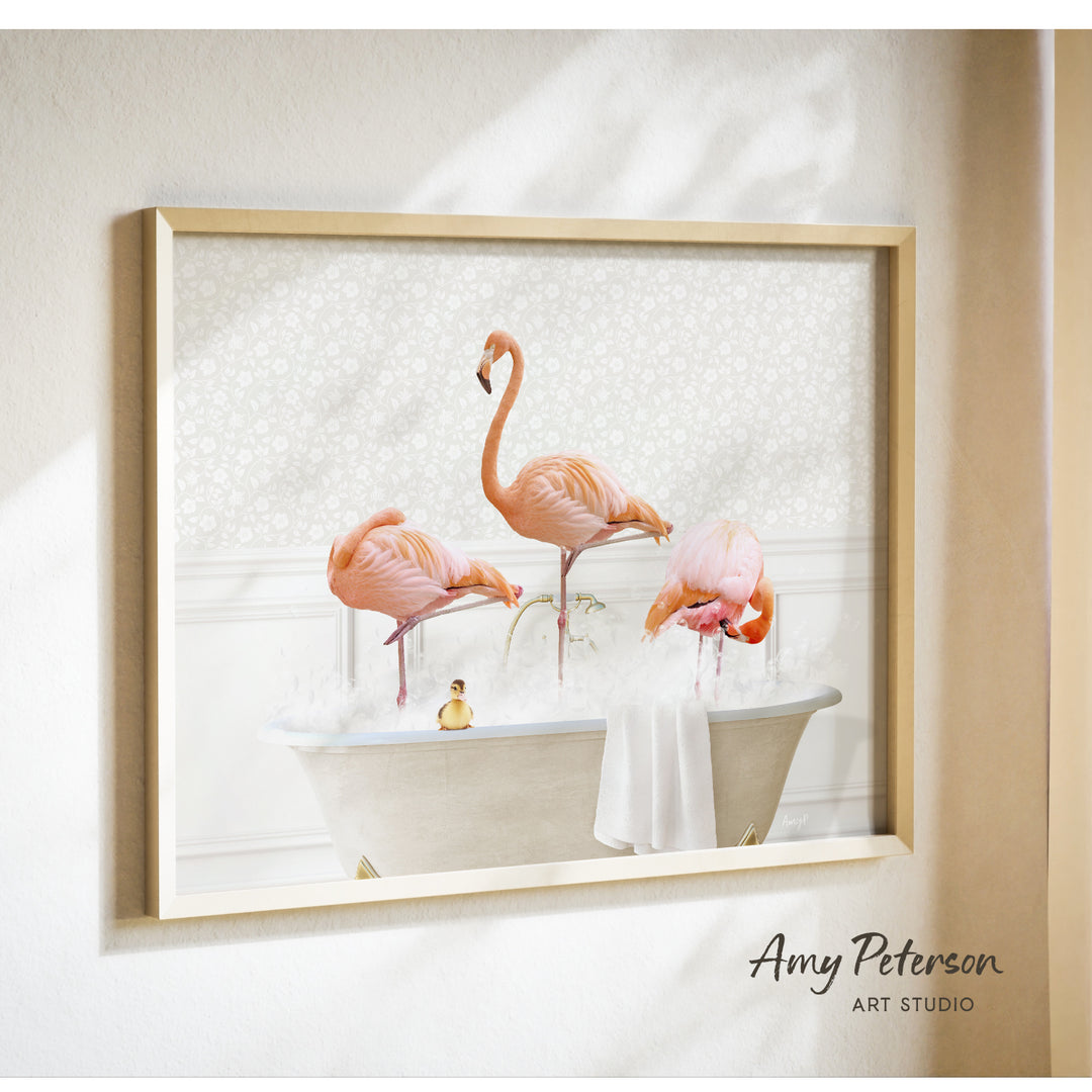 A framed print of a pink flamingo standing in a bathtub filled with water, with a small yellow bird sitting on the edge of the tub.