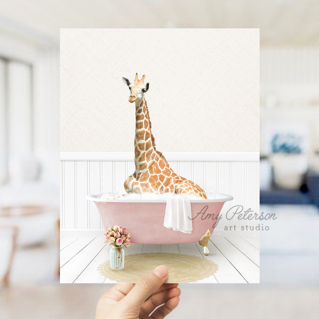 a giraffe sitting in a pink bath tub