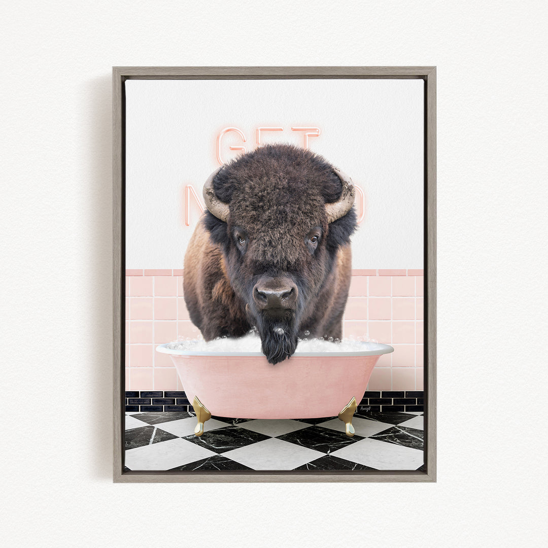 A buffalo with a long beard is sitting in a pink bathtub, with a pink and white checkered floor and a pink and white wall behind it.
