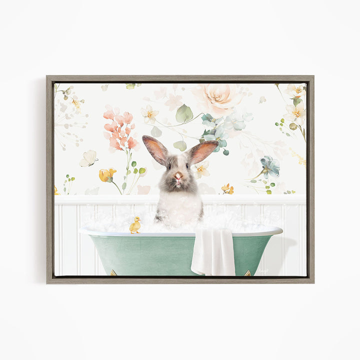 A fluffy white rabbit sits in a green bathtub filled with bubbles, surrounded by a floral wallpaper.