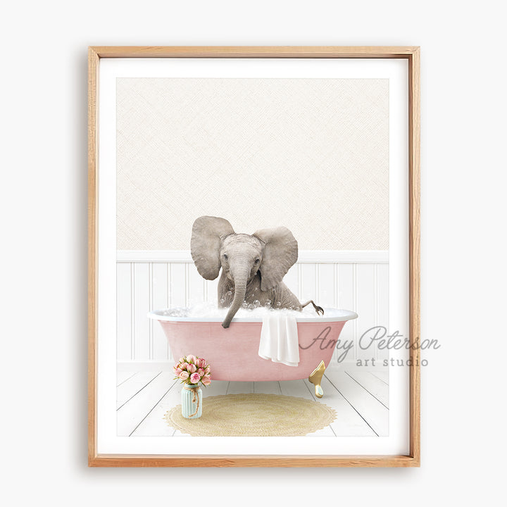 a picture of an elephant taking a bath