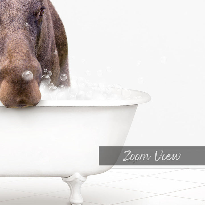 A dog is sitting in a white bathtub filled with bubbles, looking at the camera.