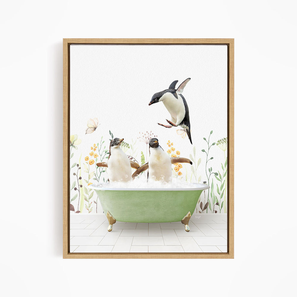 A framed image depicting two penguins sitting in a green bathtub, surrounded by flowers and plants, with one penguin flying towards the other.