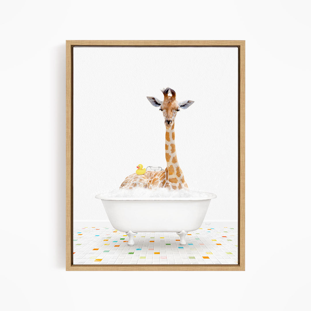A giraffe is sitting in a white bathtub filled with bubbles, surrounded by a colorful tiled floor.