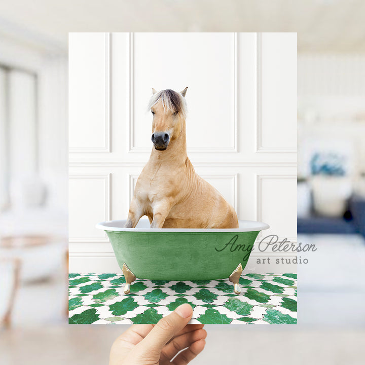 a person holding a card with a horse in a bathtub