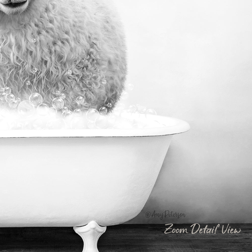 A fluffy white dog is sitting in a white bathtub filled with bubbles, enjoying a bath.