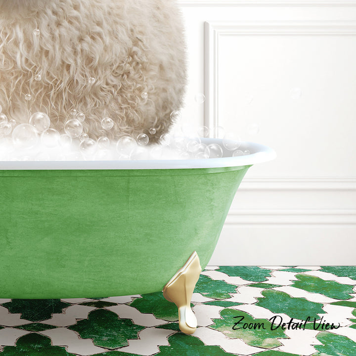 A fluffy white dog is sitting in a green bathtub filled with bubbles, with a patterned green and white rug visible in the foreground.