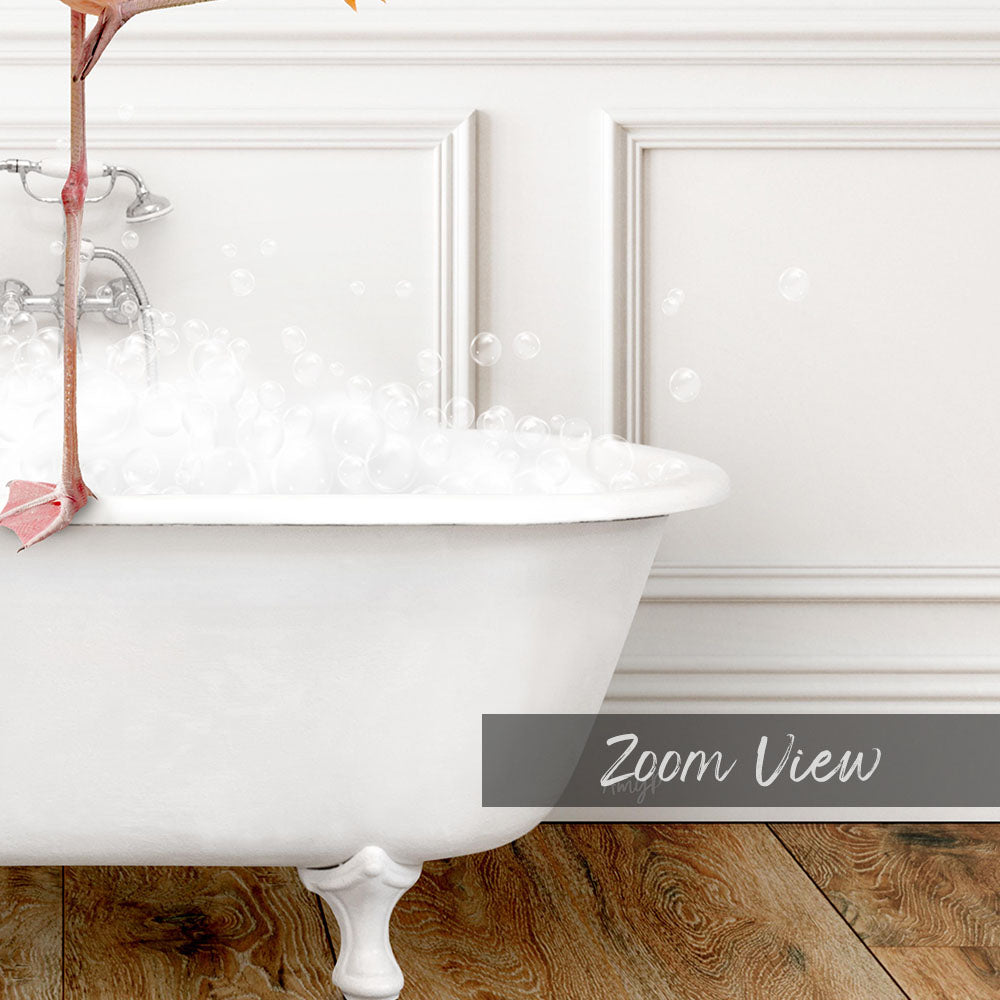 A white claw-foot bathtub filled with bubbles, with a pink flower attached to the side.