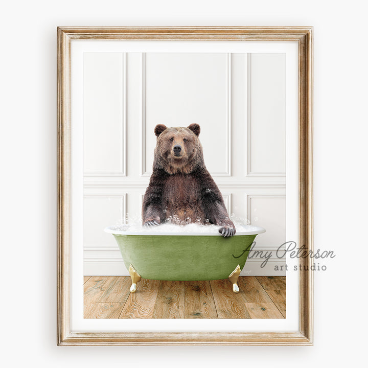 a brown bear sitting in a green bath tub