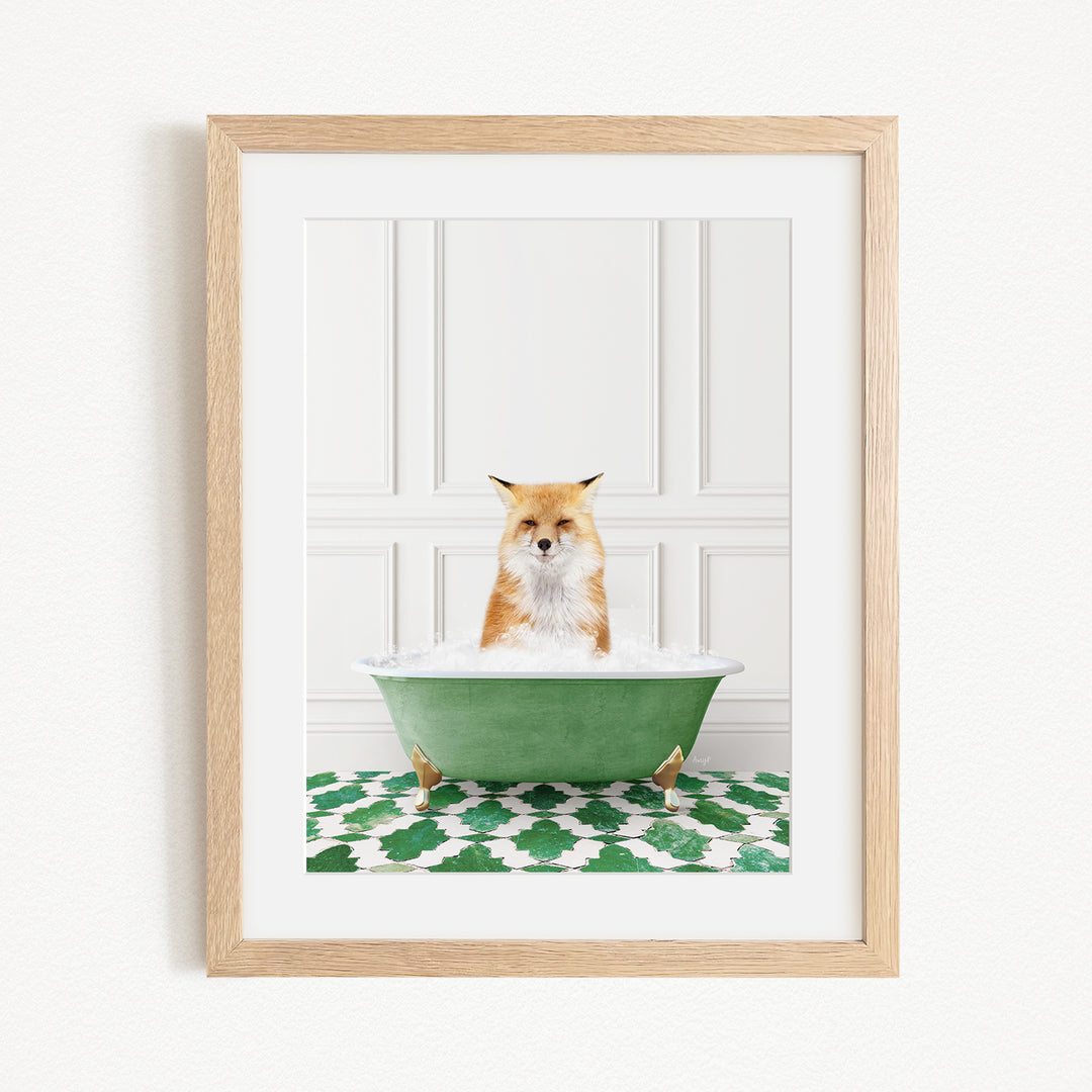 A red fox is sitting in a green bathtub filled with water, with a green and white patterned rug on the floor.