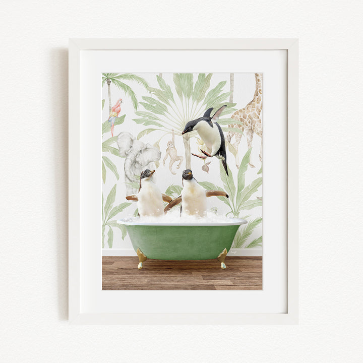 A framed image depicting three penguins sitting in a green bathtub, surrounded by a tropical jungle wallpaper.