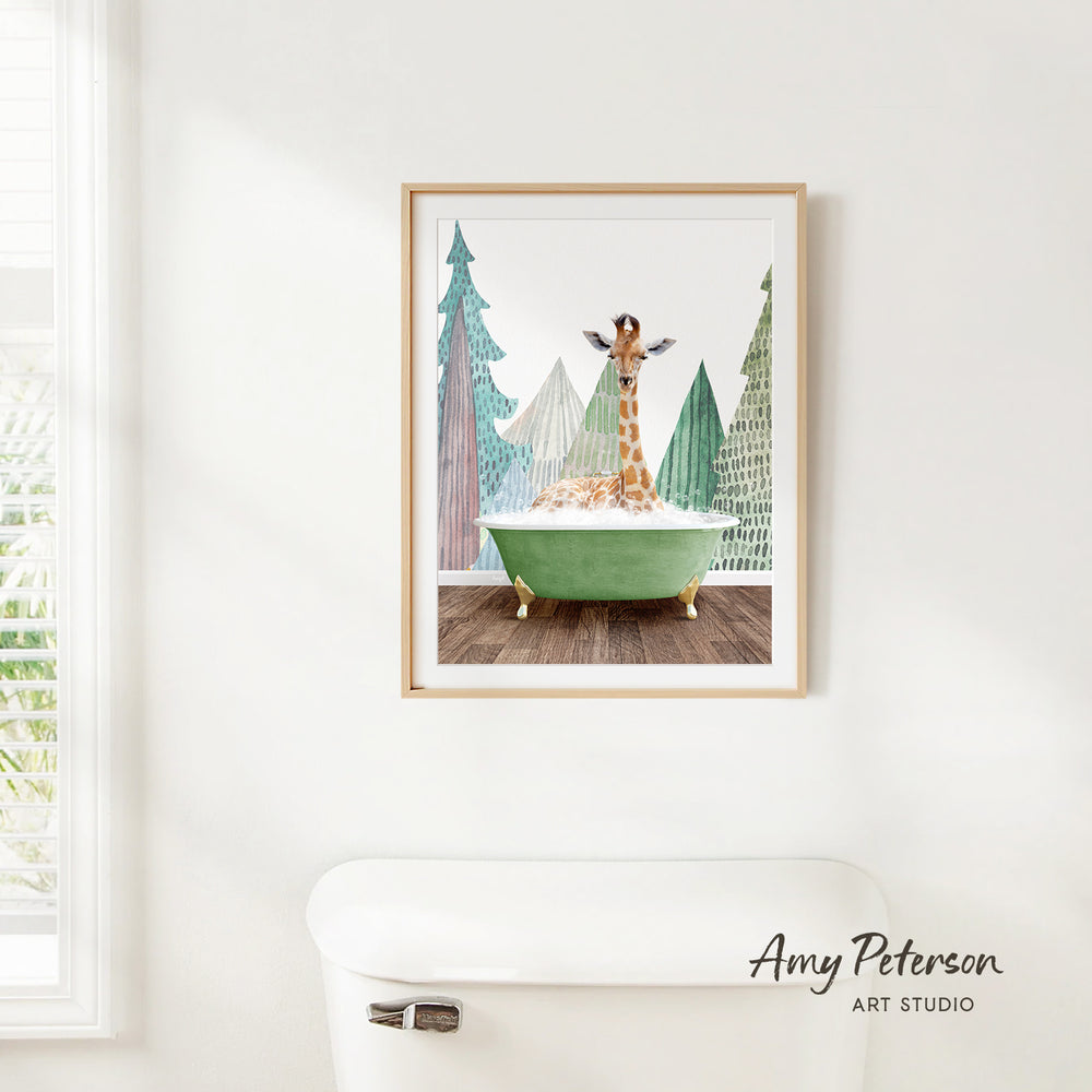 A framed painting of a giraffe sitting in a green bathtub, surrounded by trees, is hanging on a white wall.