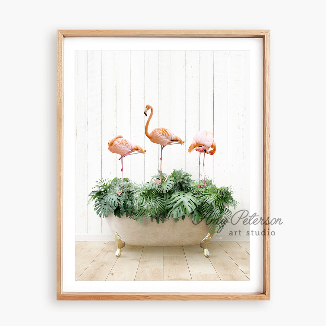 a picture of three flamingos in a bathtub