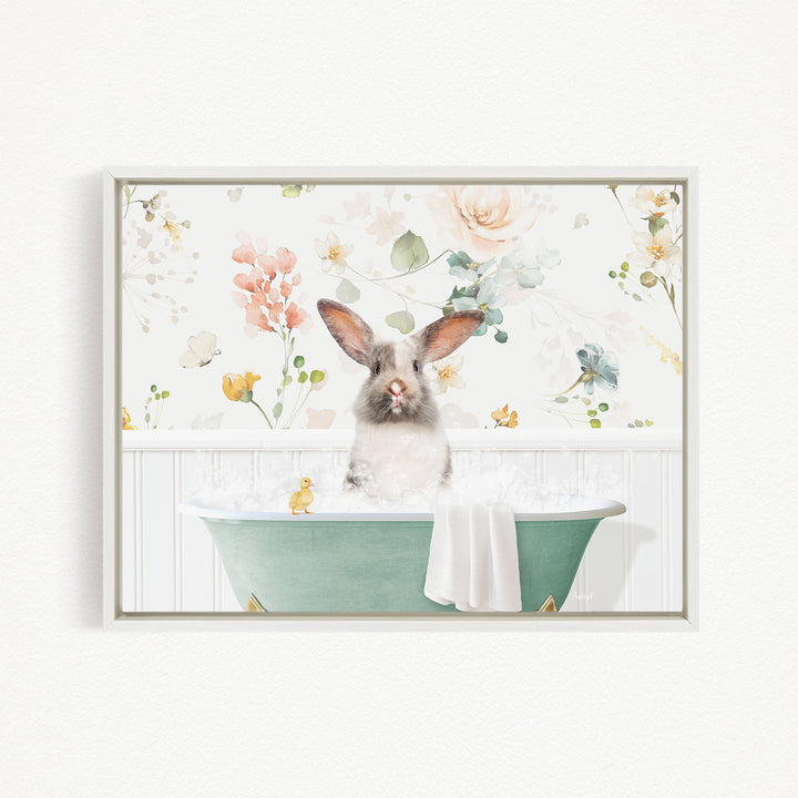A cute rabbit sitting in a green bathtub filled with bubbles, surrounded by a floral pattern.