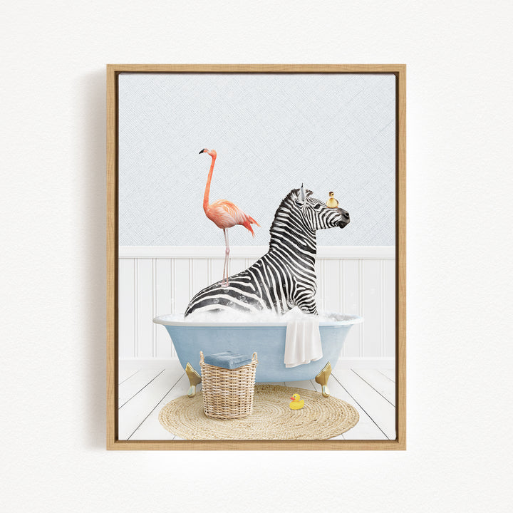 A zebra is sitting in a blue bathtub, surrounded by a pink flamingo, a yellow rubber duck, and a basket.