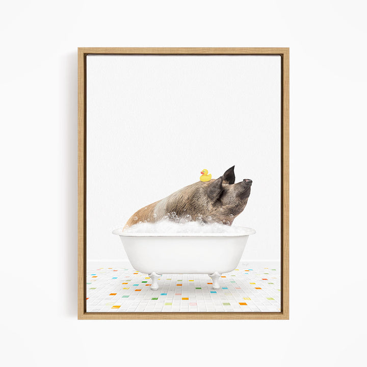 A pig sitting in a white bathtub filled with bubbles, with a rubber duck floating on top.