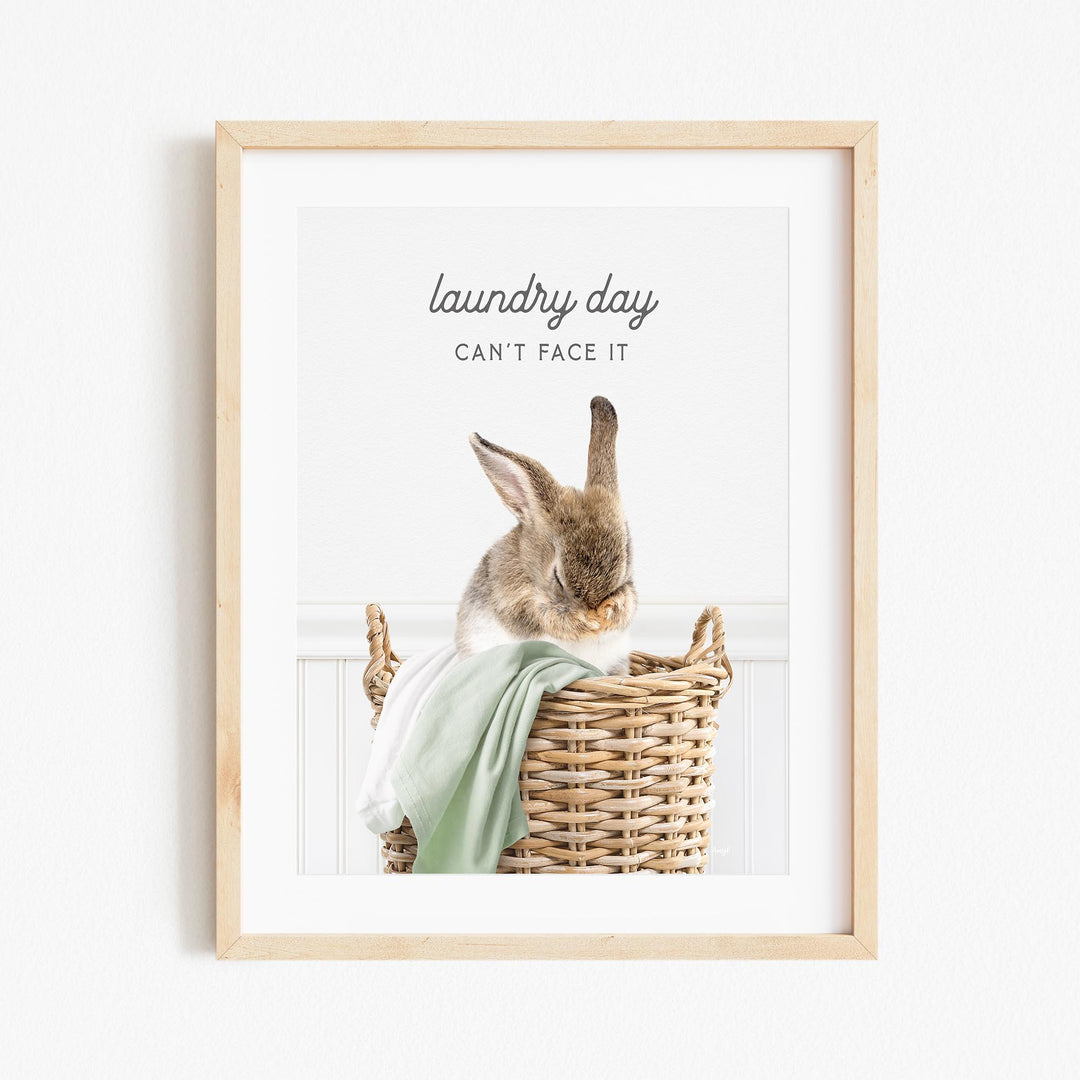 a picture of a bunny sitting in a basket