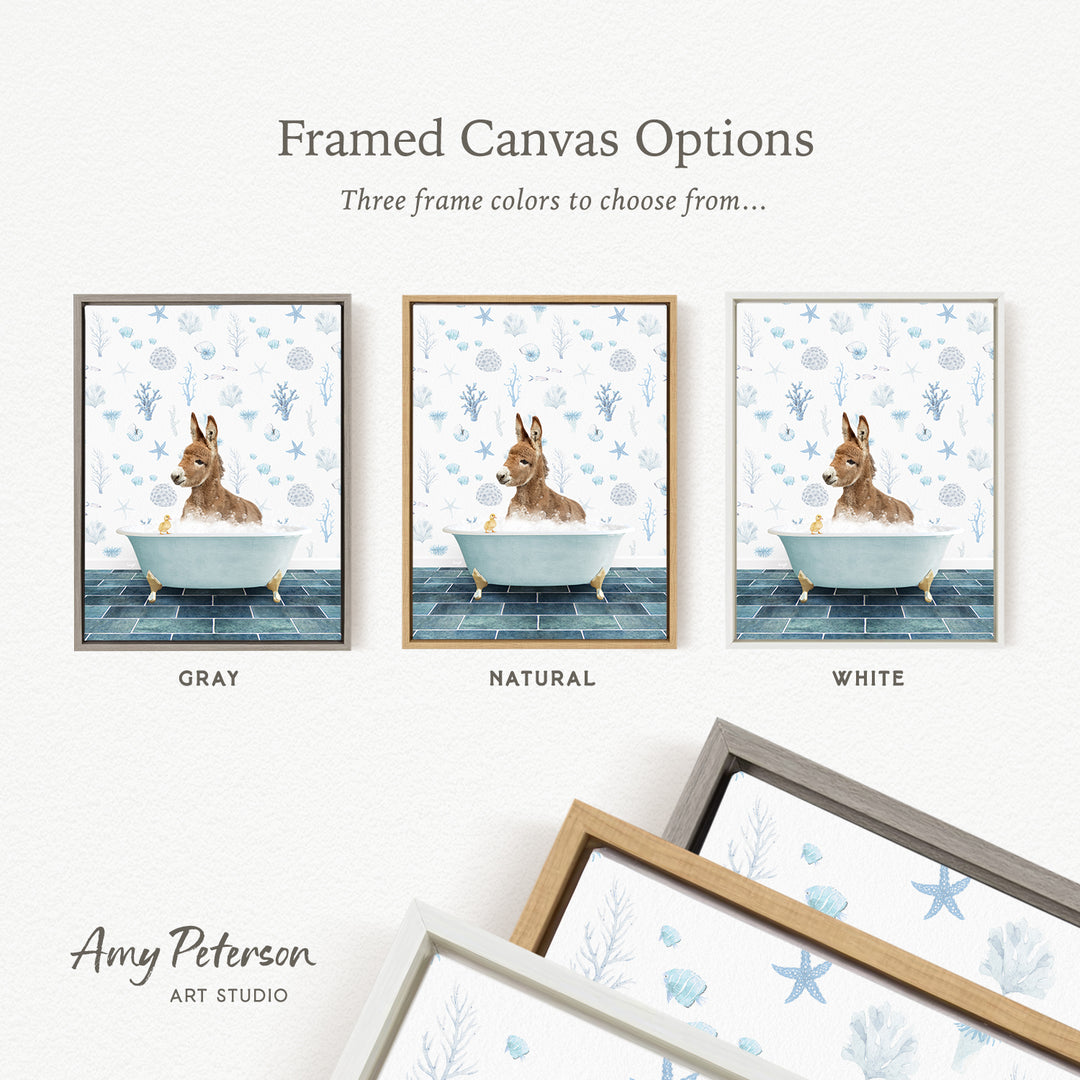 three framed canvas options featuring a donkey bath in a blue tub, with three different frame colors to choose from: gray, natural, and white.