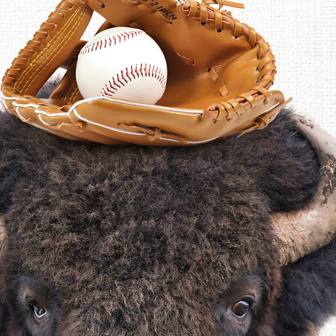 a bison with a baseball and glove on its head