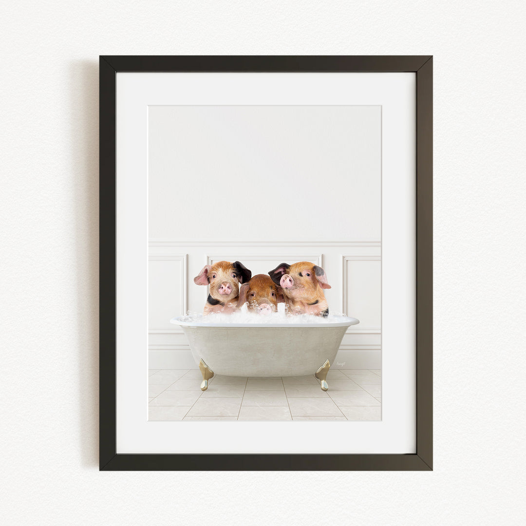Three adorable pigs sitting in a white bathtub, enjoying a relaxing bath.