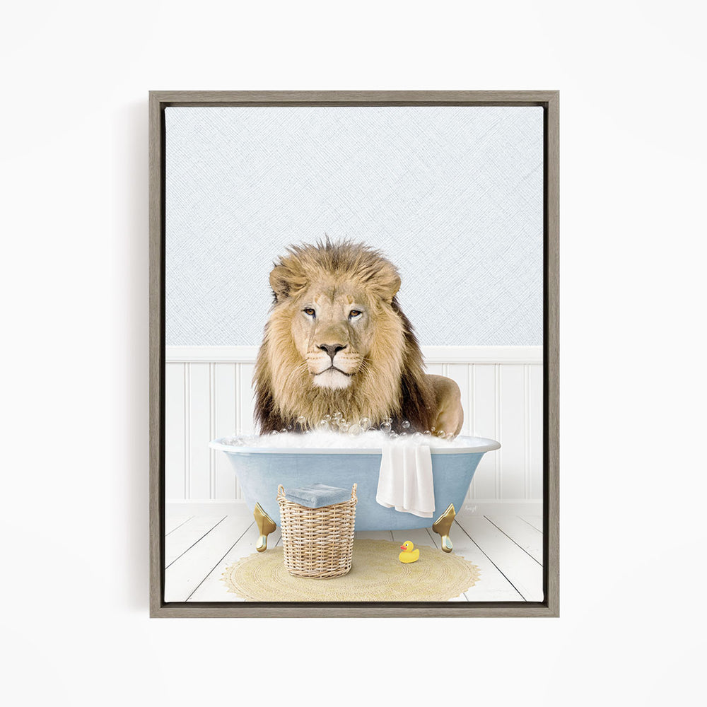 A lion sitting in a bathtub filled with water, surrounded by rubber ducks.