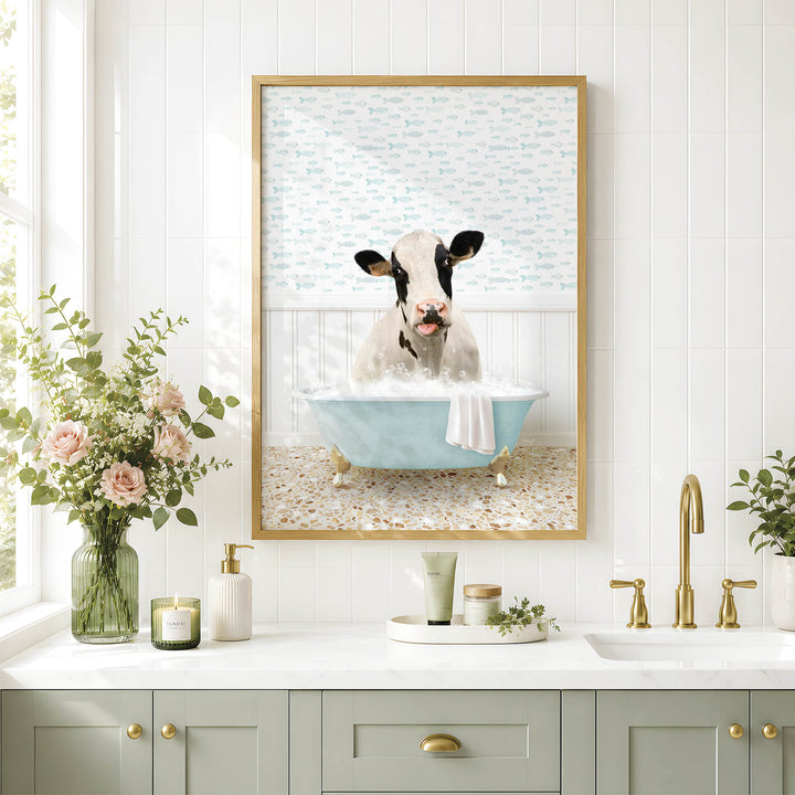 a cow sitting in a bathtub, surrounded by flowers and a framed picture of the cow.
