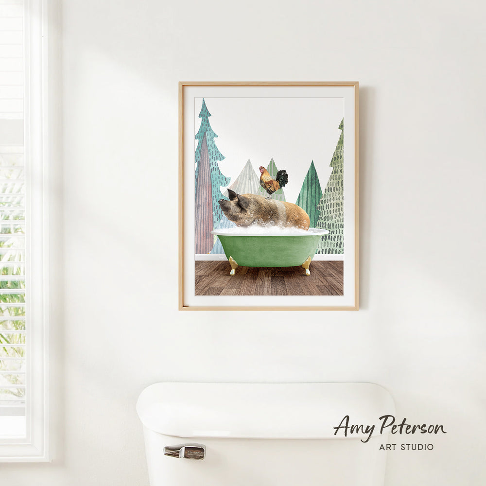 A framed image of a dog sitting in a green bathtub, surrounded by a snowy landscape with pine trees.