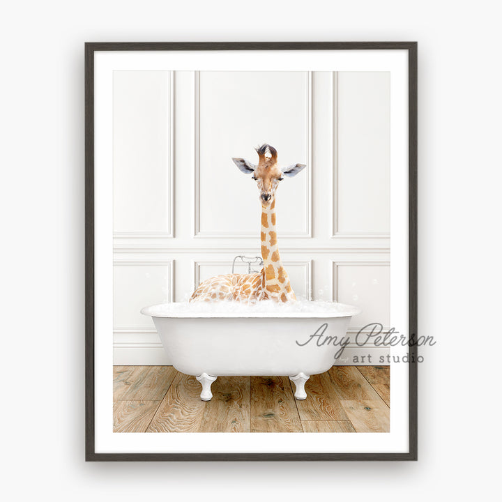 a baby giraffe is sitting in a bathtub