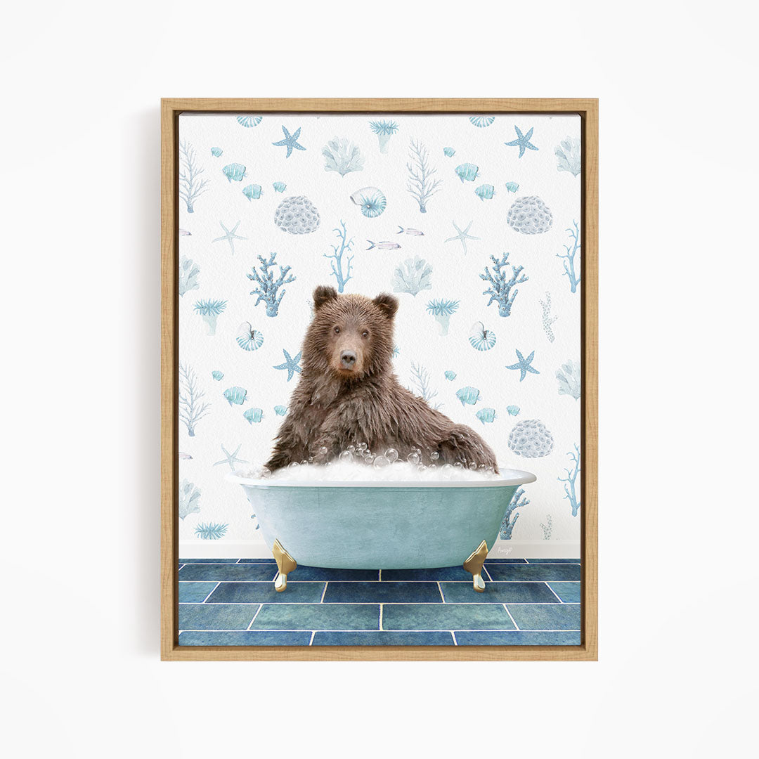A brown bear sitting in a blue bathtub filled with bubbles, surrounded by a pattern of seashells, starfish, and other marine life.