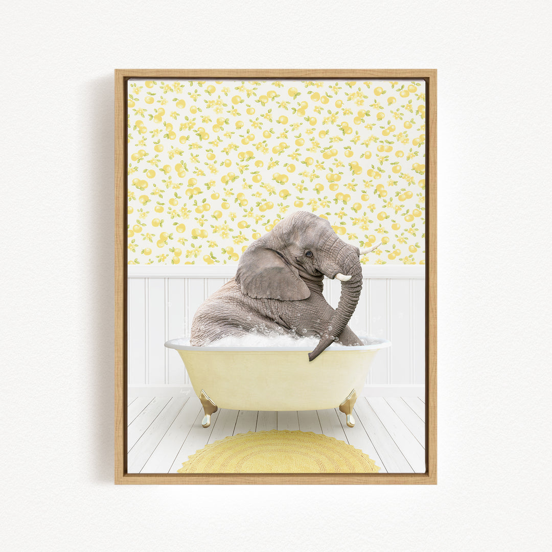 A gray elephant is sitting in a white bathtub filled with water, surrounded by a yellow floral pattern on the wall behind it.