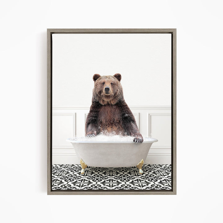 A brown bear sitting in a white bathtub filled with water, surrounded by a black and white patterned floor.
