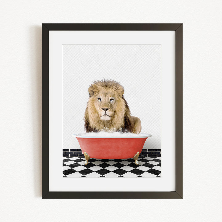 A lion sitting in a red bathtub on a black and white checkered floor.