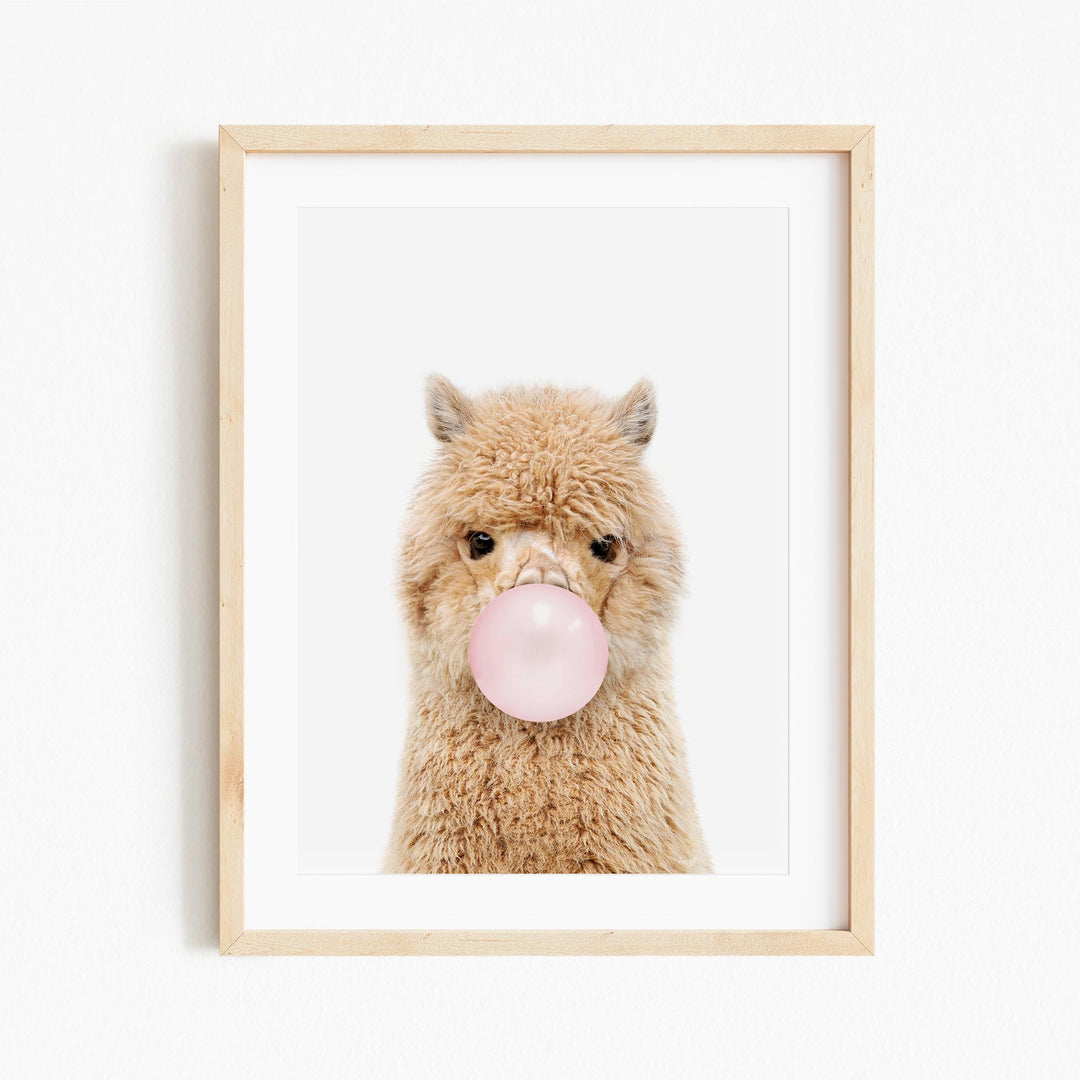 a picture of a stuffed animal with a bubble in it's mouth