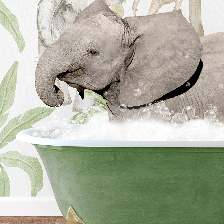 an elephant taking a bath in a green bathtub